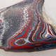 Image for article titled These Gorgeous Stones Are Actually Polished Chunks Of Car Paint